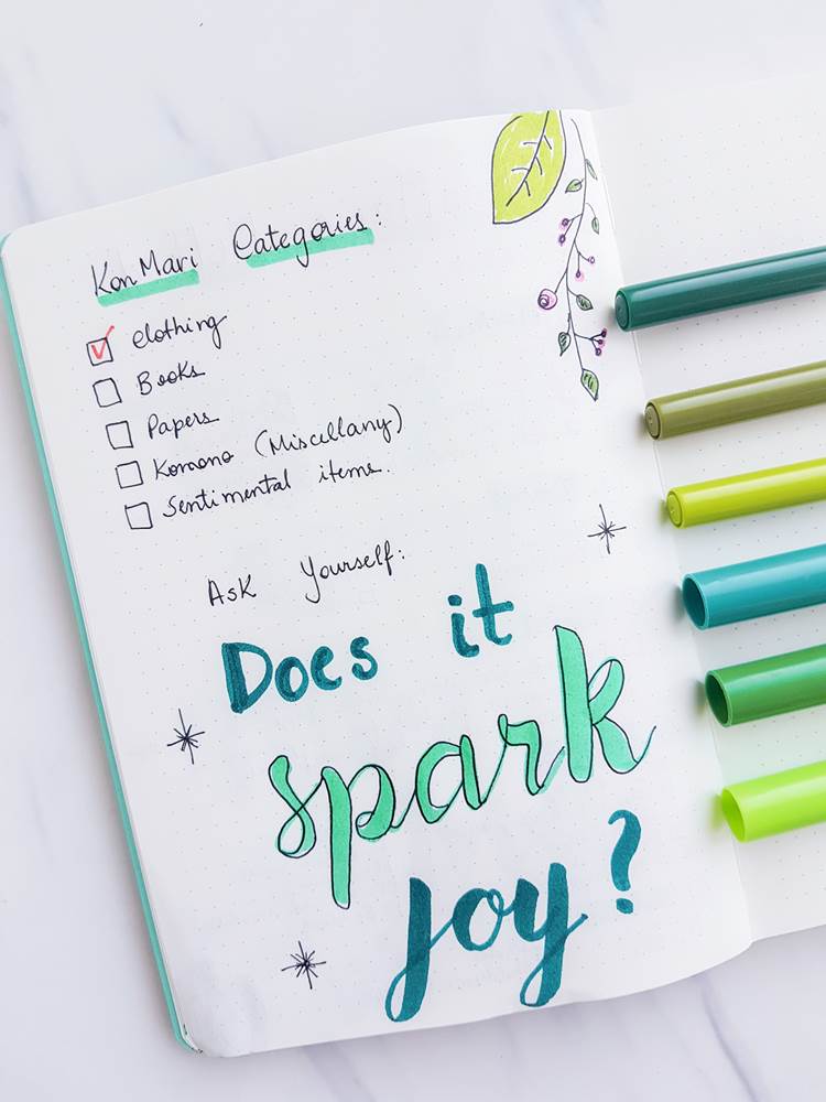Does it spark joy? How to declutter your life and home with the Konmari method using the bullet journal checklist system. Free konmari pdf included. 