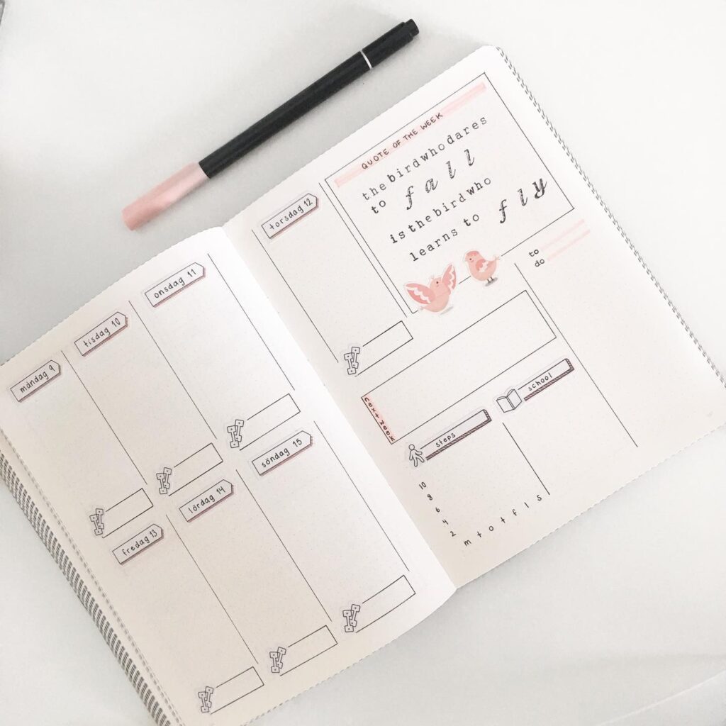 Open journal with weekly planner layout and motivational quote, featuring pastel colors and bird illustrations.