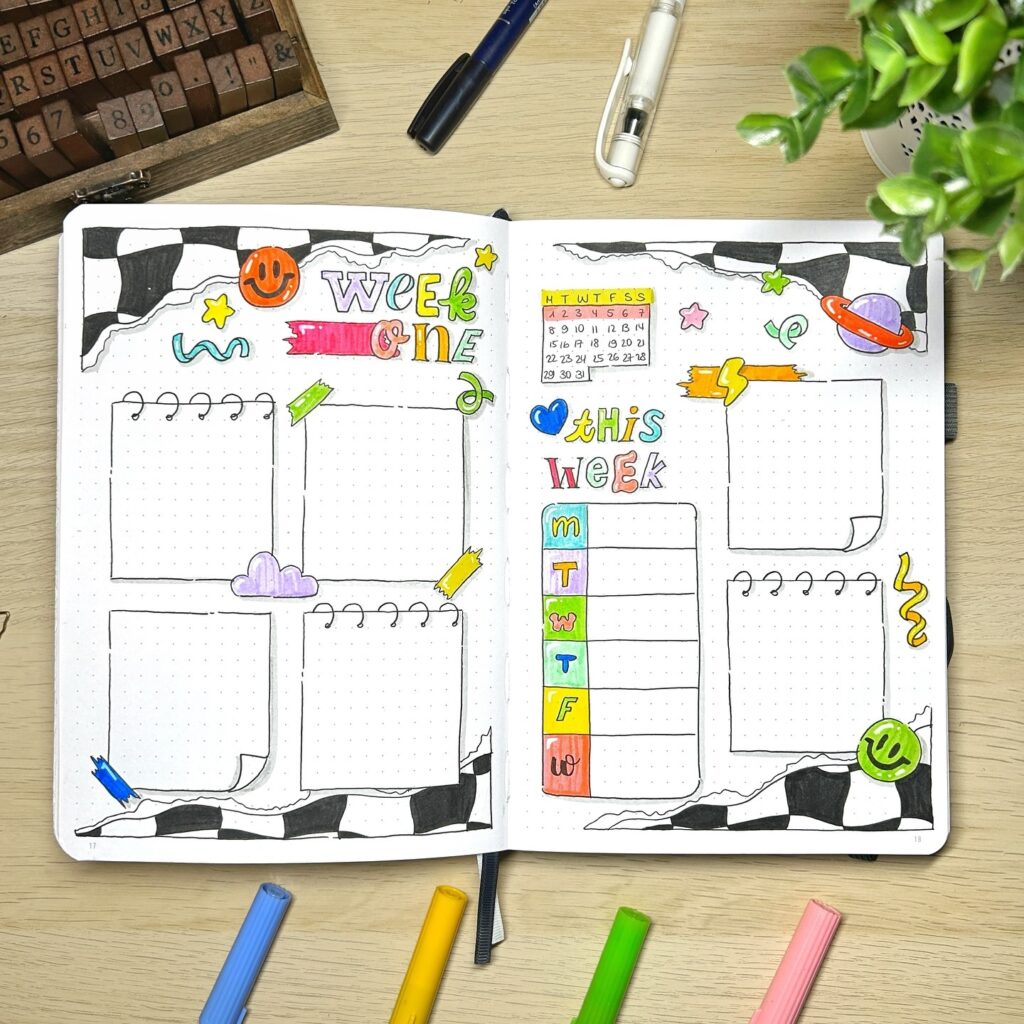 Colorful bullet journal weekly planner with doodles on a wooden desk, surrounded by pens, markers, and a plant.