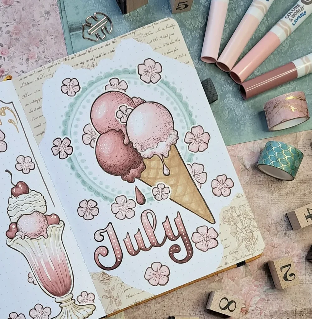 July bullet journal spread with ice cream, pink flowers, and pastel decor.