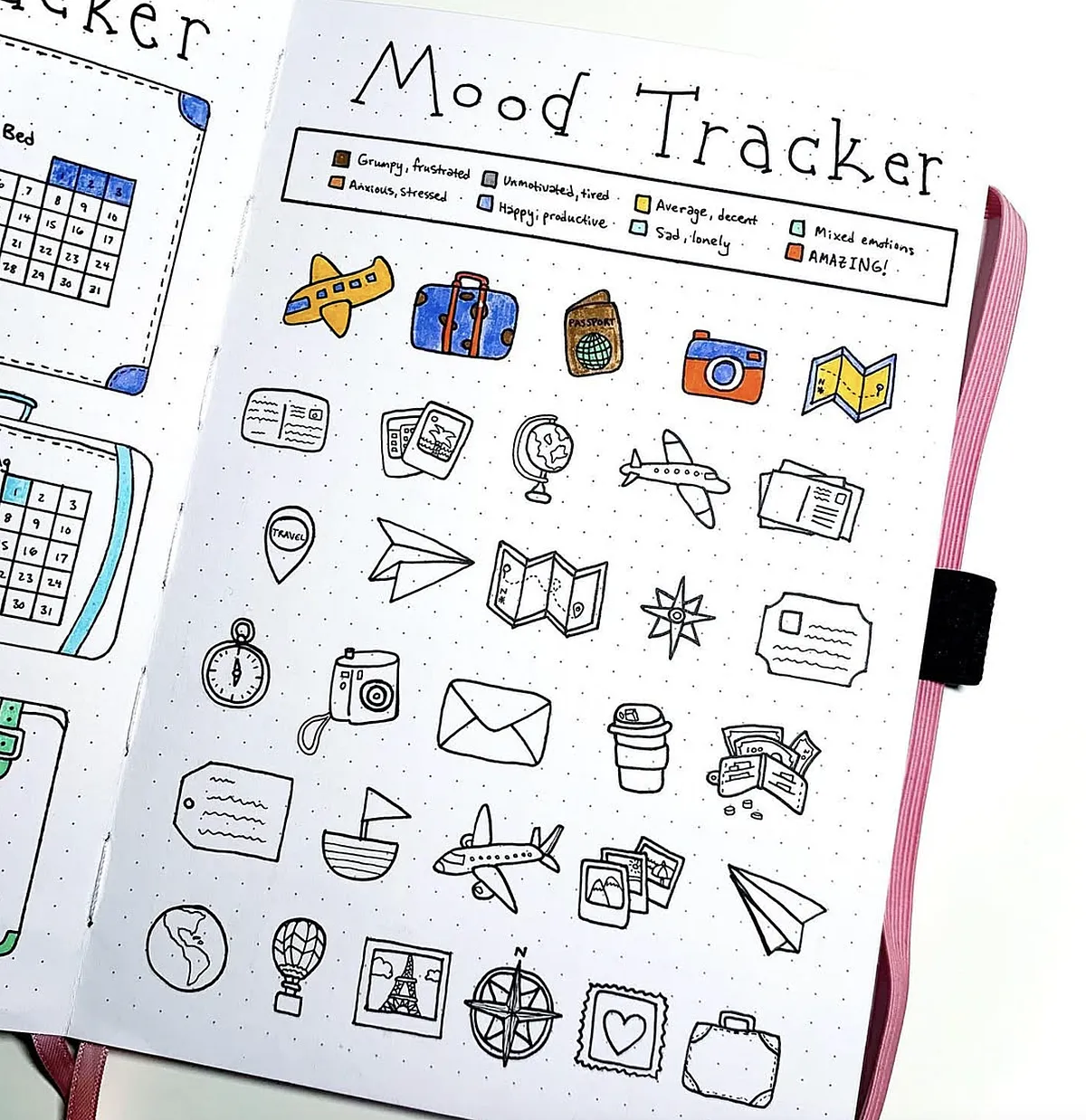 Bullet journal mood tracker with travel-themed doodles and color-coded key for various emotions.