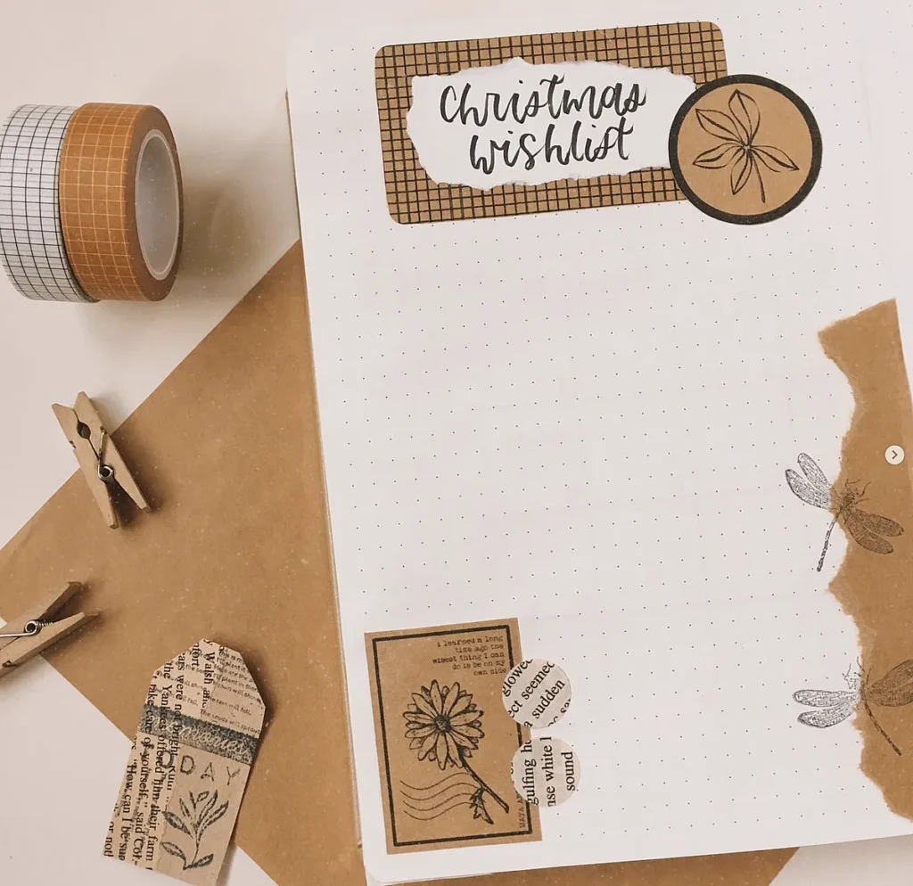 Bullet journal Christmas wishlist layout with decorative elements and washi tape.