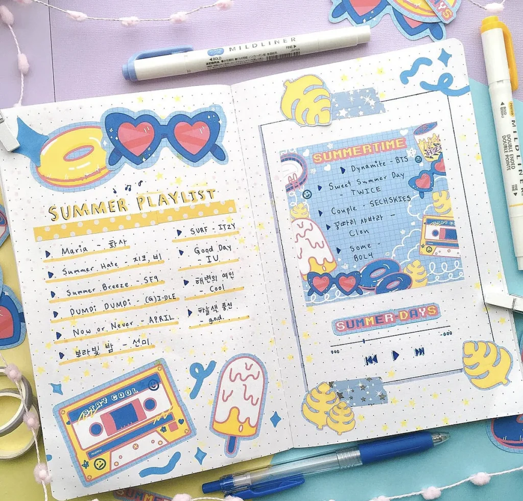 Colorful summer playlist bullet journal spread with pens and cute doodles, featuring music lists and cassette tape design.