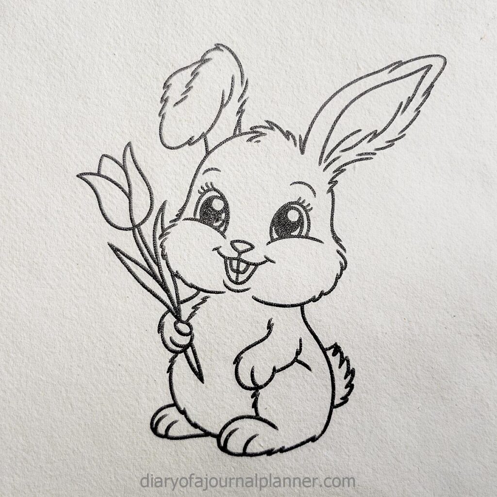 Cute cartoon bunny holding a flower, black and white line drawing perfect for coloring pages.