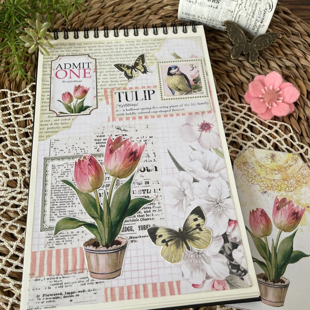 Vintage-style scrapbook page with tulips, butterflies, and floral designs.