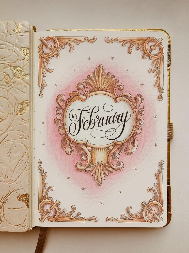 Elegant February journal page with ornate gold and pink design, enhancing a vintage aesthetic.