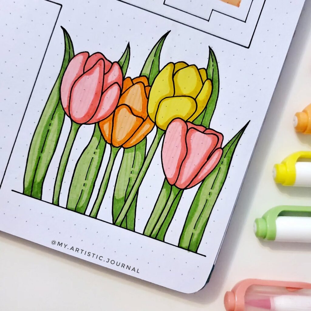 Colorful tulip illustration on dotted paper with pastel highlighters. Perfect for artistic journal inspiration.