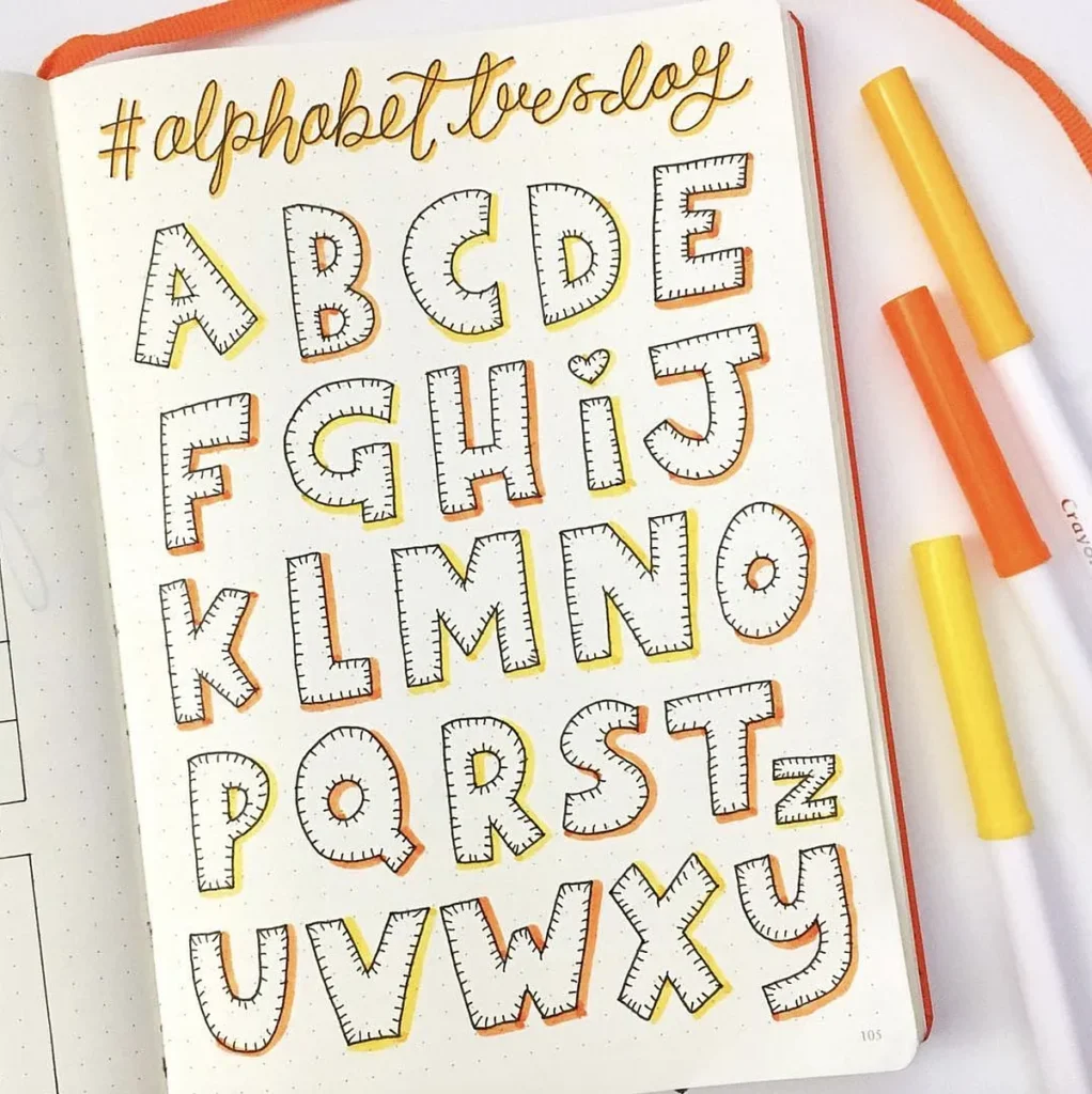 Hand-drawn decorative alphabet journal page with colorful markers. #AlphabetTuesday creativity.
