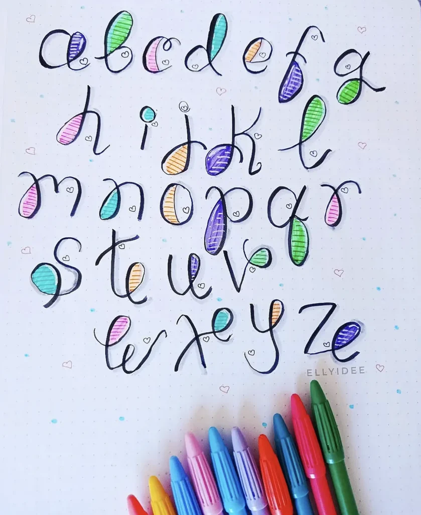 Whimsical handwritten alphabet with colorful doodles and pens, perfect for creative lettering designs.