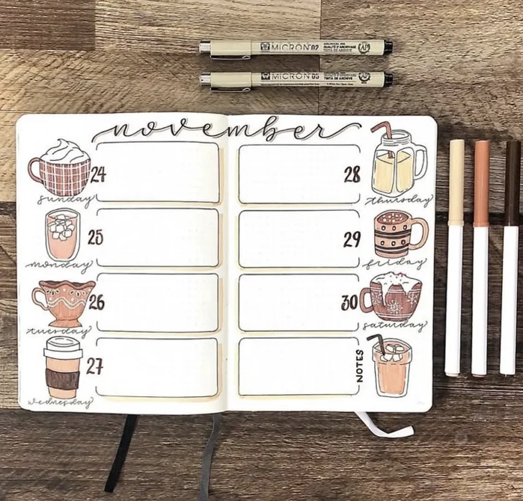 Bullet journal weekly spread for November 24-30 with coffee-themed doodles and pens on a wooden table.