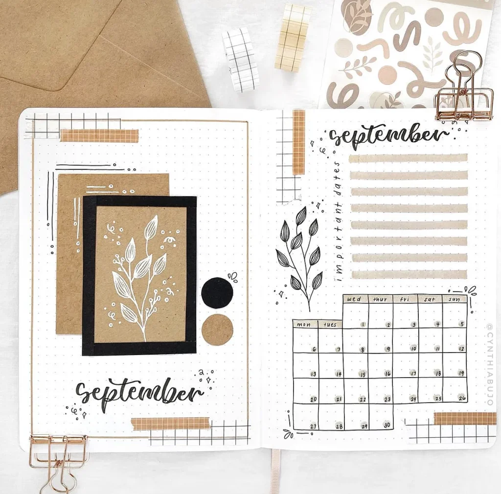 September bullet journal spread with leaf designs, a calendar, and decorative elements in earthy tones.