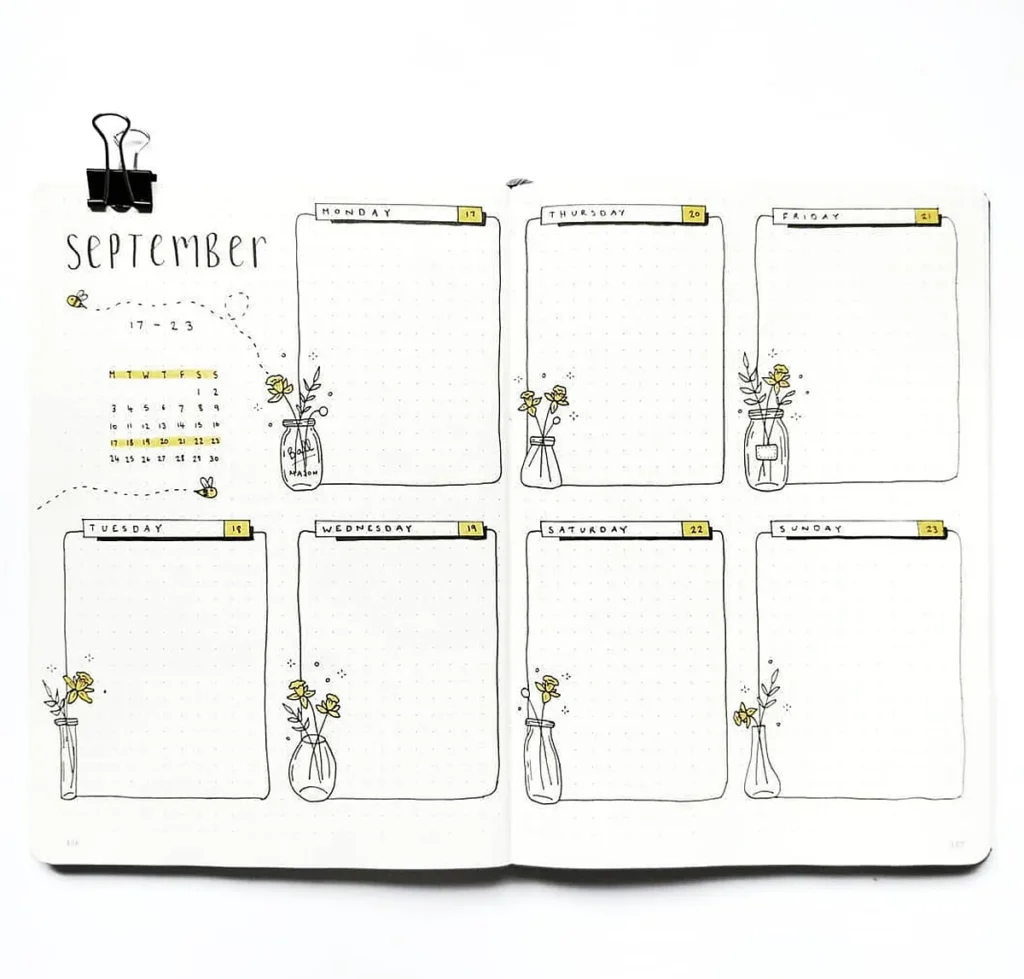 Bullet journal weekly spread for September 17-23 with floral doodles and a minimalist design.