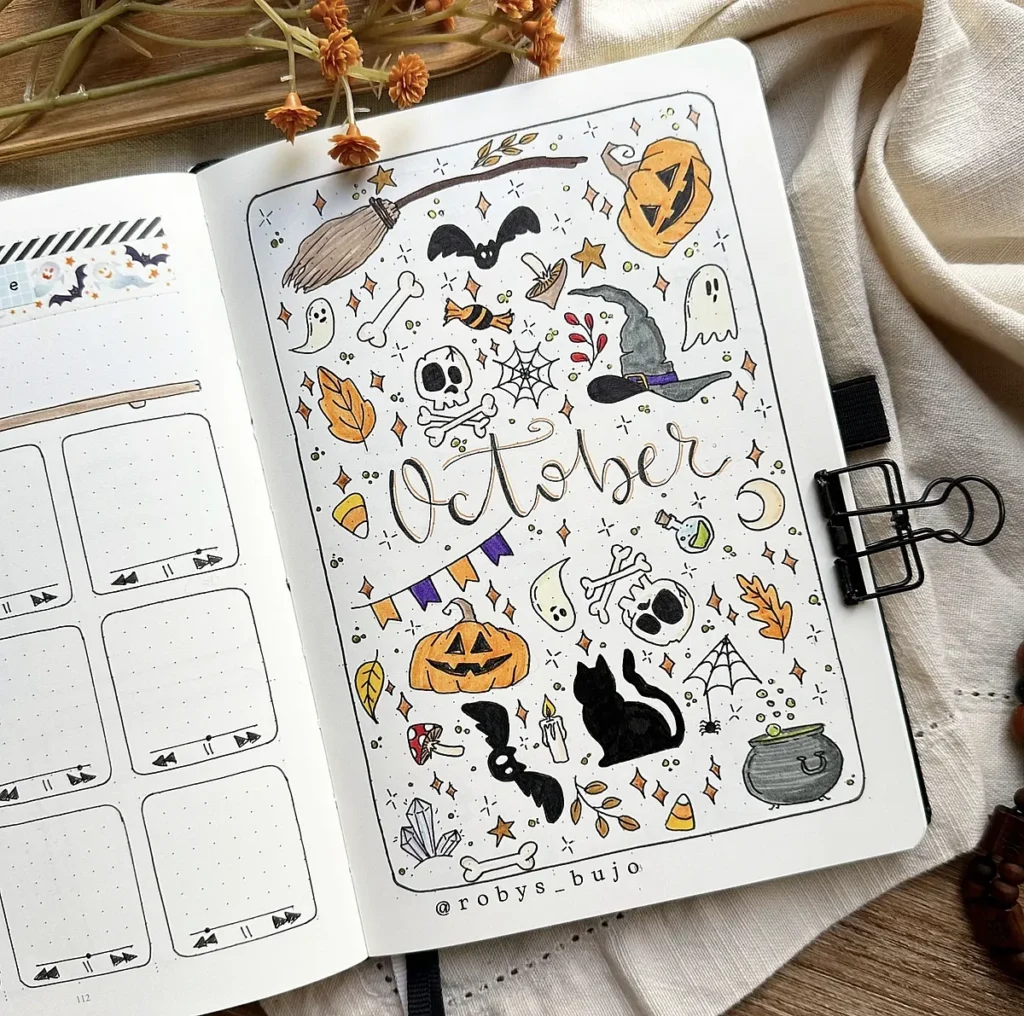Bullet journal page with October-themed doodles: pumpkins, ghosts, bats, and Halloween decor on a festive layout.