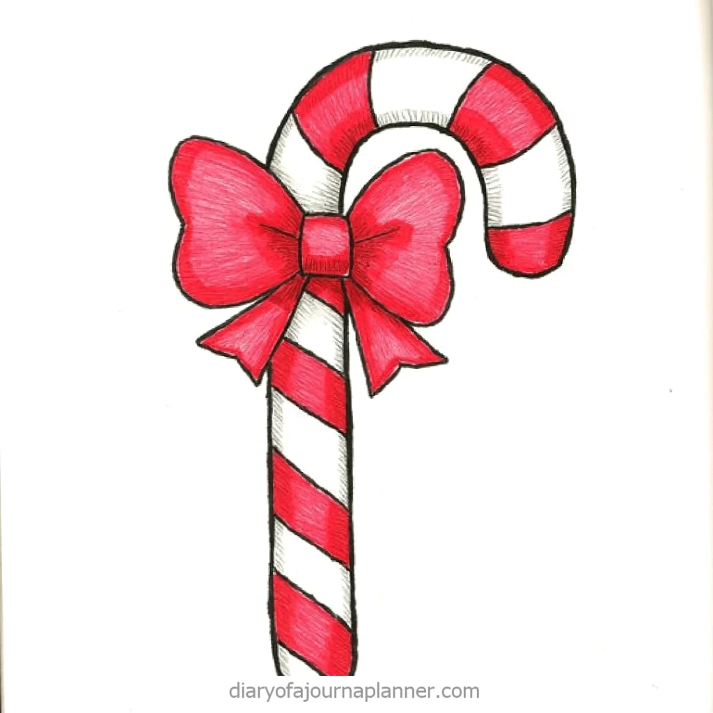 Candy cane with red stripes and bow, festive holiday decoration on white background.