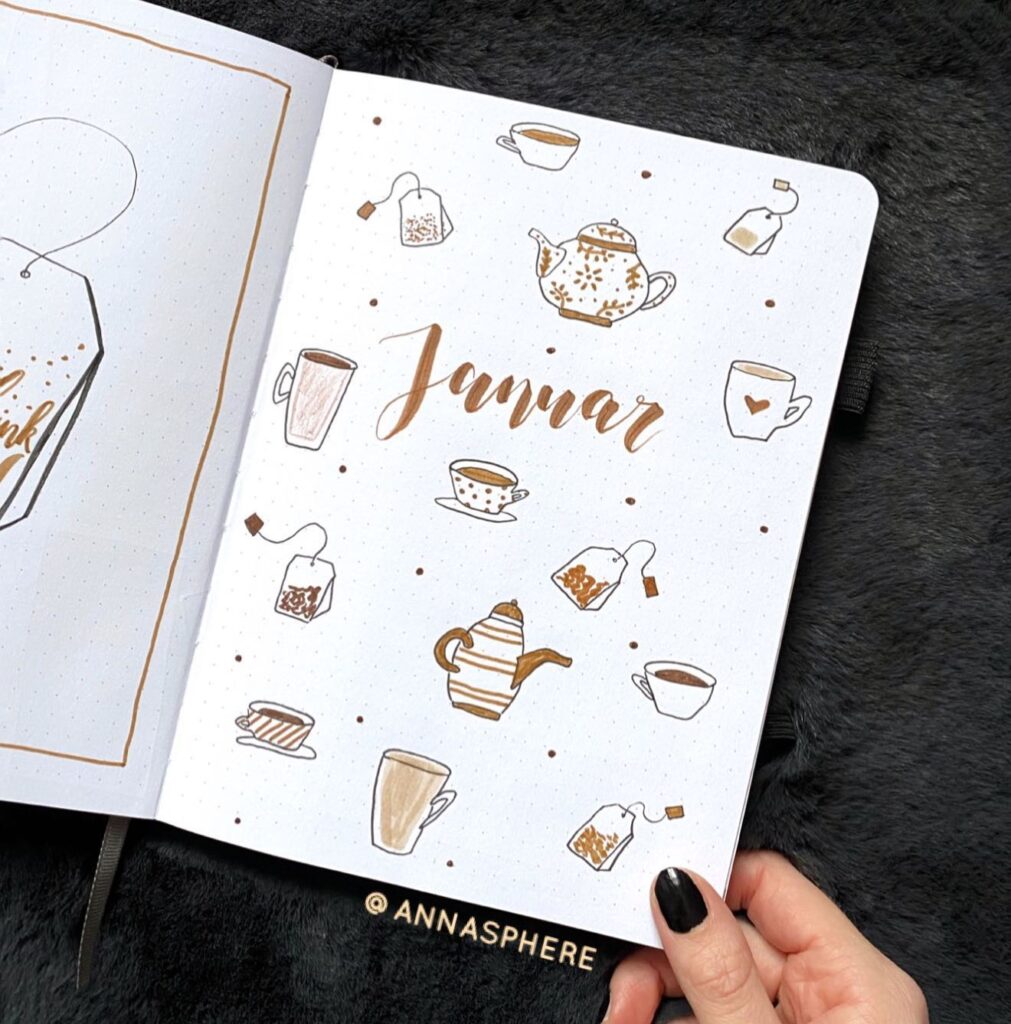 Decorative bullet journal page for January with tea-themed illustrations in brown on a white background.