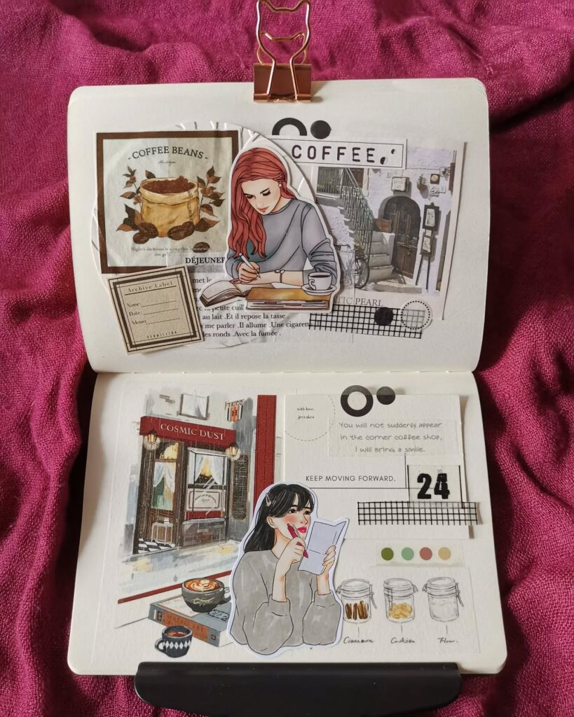 Decorative journal pages featuring coffee shop themes, illustrations, and motivational quotes on a pink fabric background.