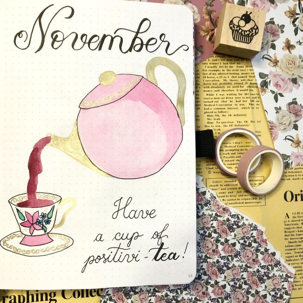 November bullet journal page with pink teapot and floral teacup, captioned Have a cup of positi-tea!