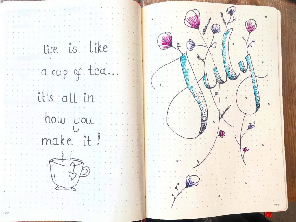 Open journal with doodles and quote: Life is like a cup of tea... it's all in how you make it! with July stylized.