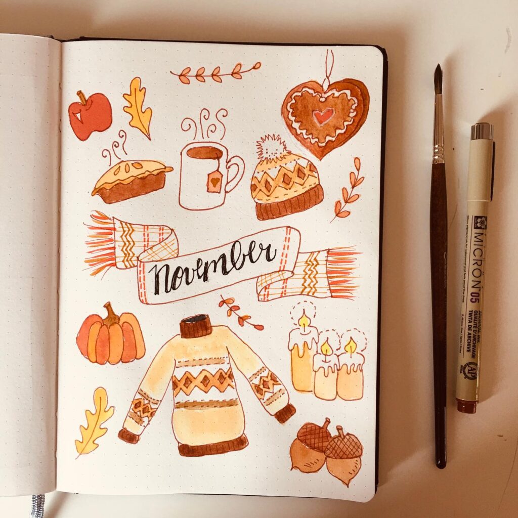 November-themed doodles with cozy autumn illustrations: sweater, candles, pie, mug, pumpkin, and scarf.