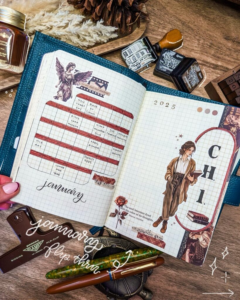 Open journal with January 2025 planner, artistic designs, and pens on a wooden table setup.