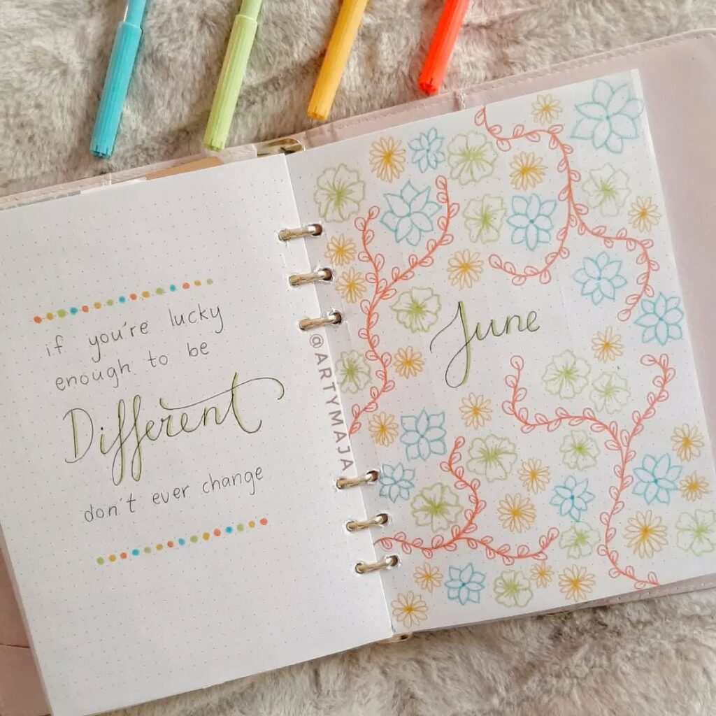 Colorful June bullet journal with floral designs and motivational quote: If you're lucky enough to be different, don't change.