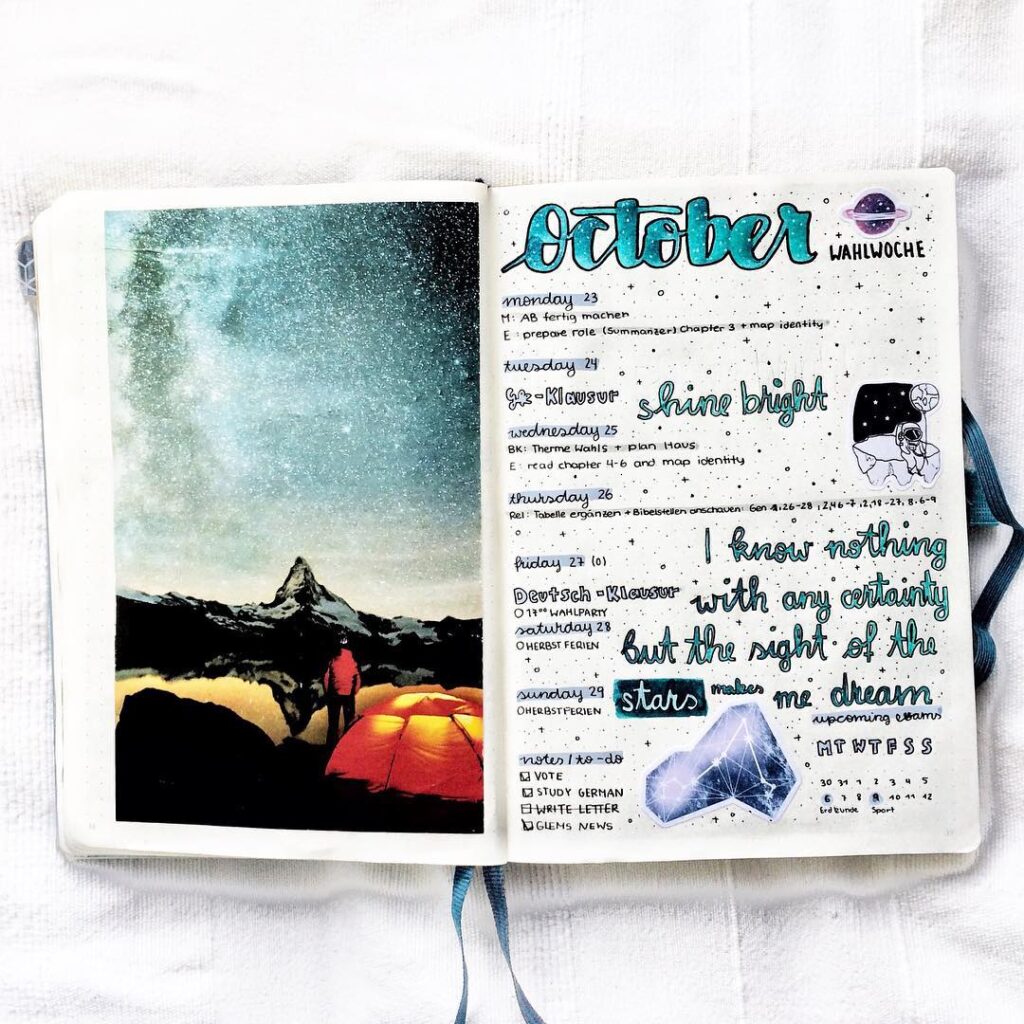 Bullet journal spread featuring October planner, notes, and quote with starry sky and camping photo on the opposite page.