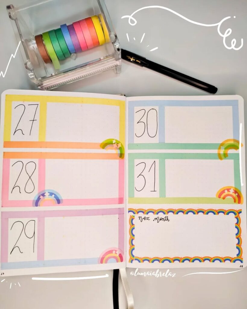 Colorful planner with rainbow-themed borders for the week of 27-31, beside a pastel washi tape set and a black pen.