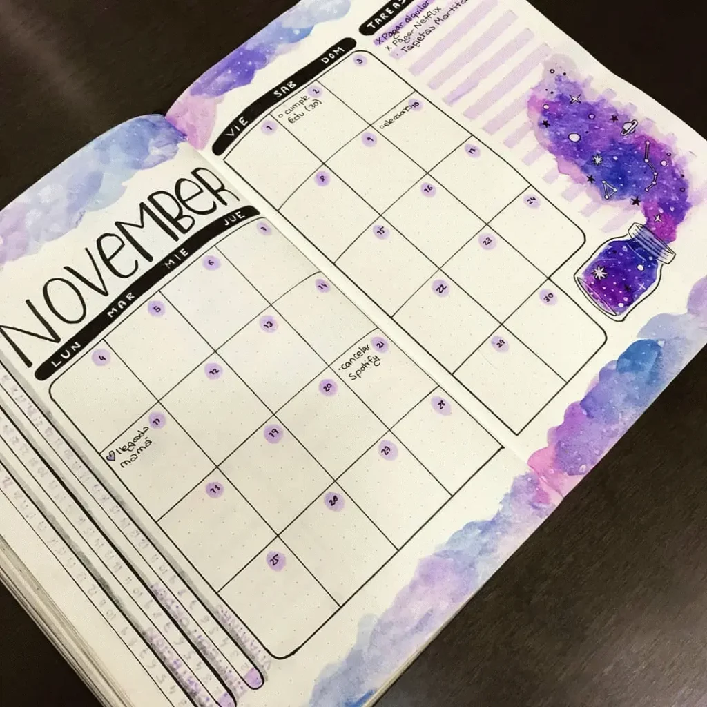November bullet journal spread with galaxy watercolor theme and task list. Perfect for organizing monthly goals.