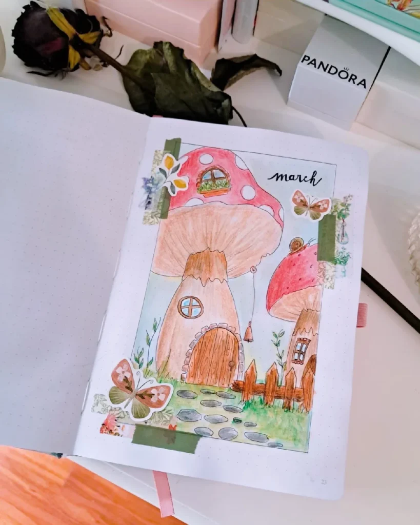 Whimsical watercolor illustration of mushroom houses in a bullet journal for March, adorned with butterflies and flowers.