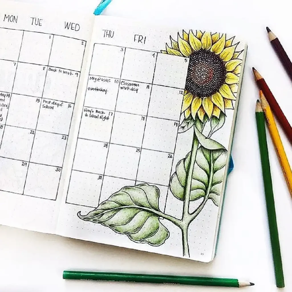 Colorful bullet journal with a sunflower illustration and calendar for planning weekly activities and events.