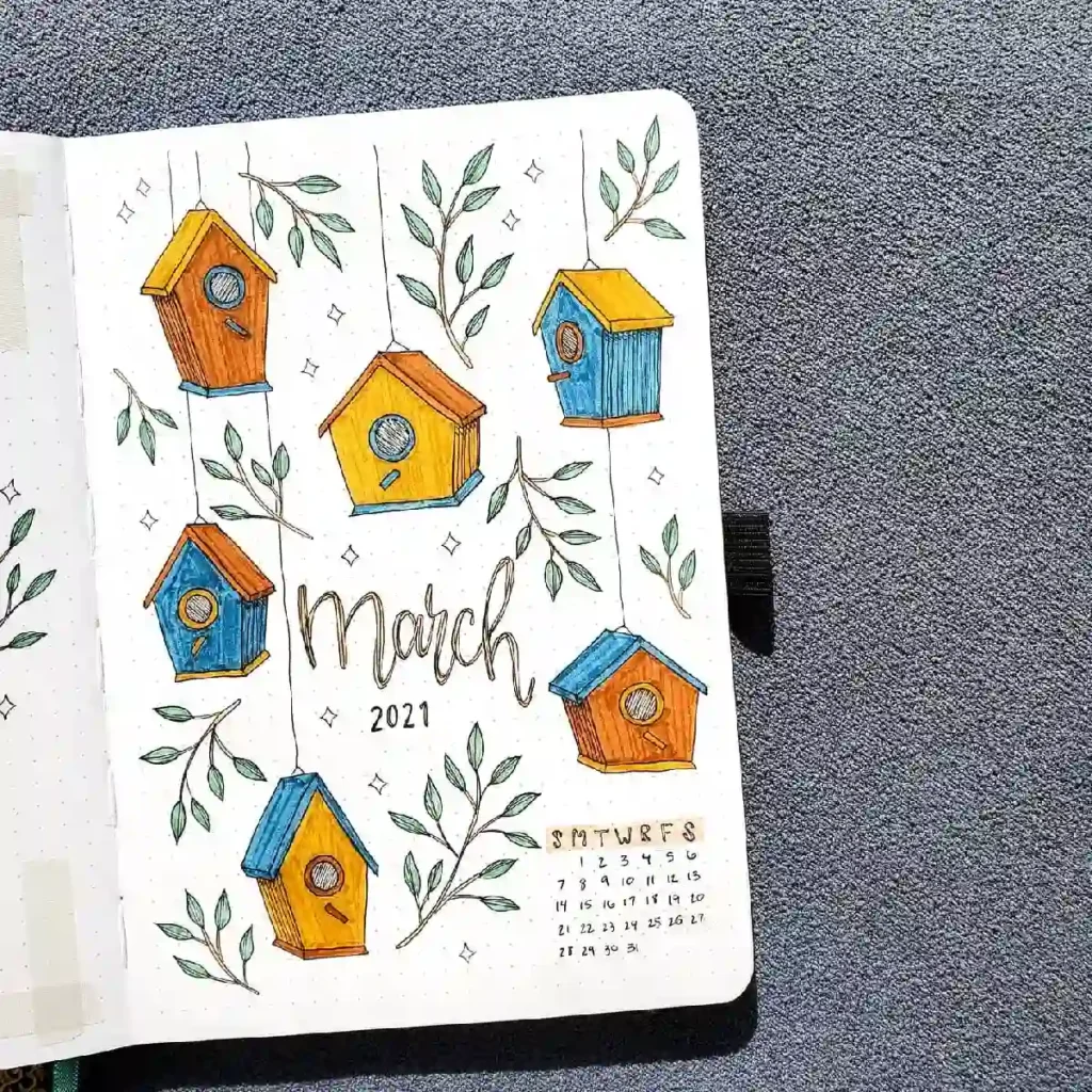 Colorful March 2021 bullet journal page featuring illustrated birdhouses and greenery, designed for organization and creativity.