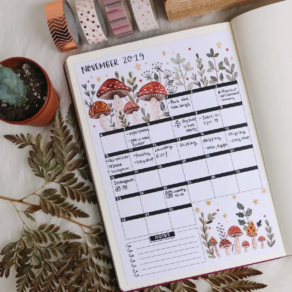 Bullet journal for November 2019 featuring a colorful calendar, to-do list, and decorative mushrooms and plants.