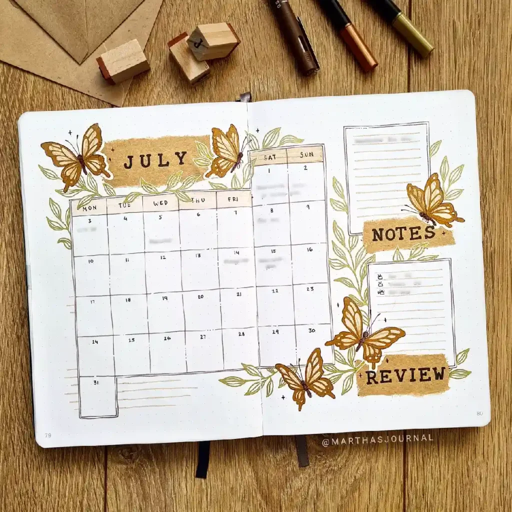Bullet journal layout for July with a calendar, notes, and review sections, adorned with butterflies and foliage.