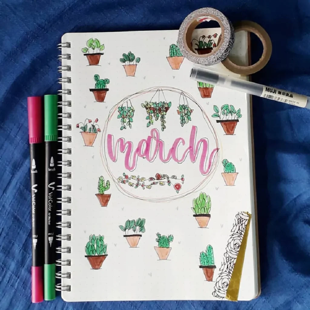 Bullet journal page for March featuring hand-drawn cacti, colorful pens, and decorative washi tape.