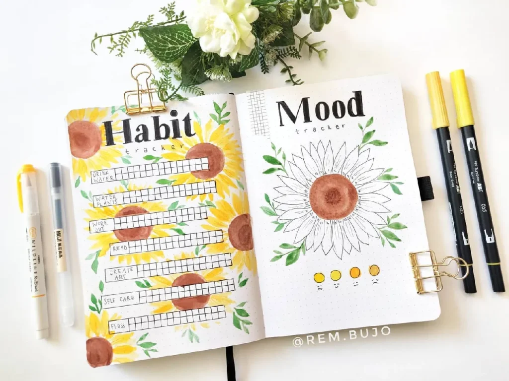 Colorful bullet journal spread featuring a habit tracker with sunflowers and a mood tracker with a sunflower illustration.