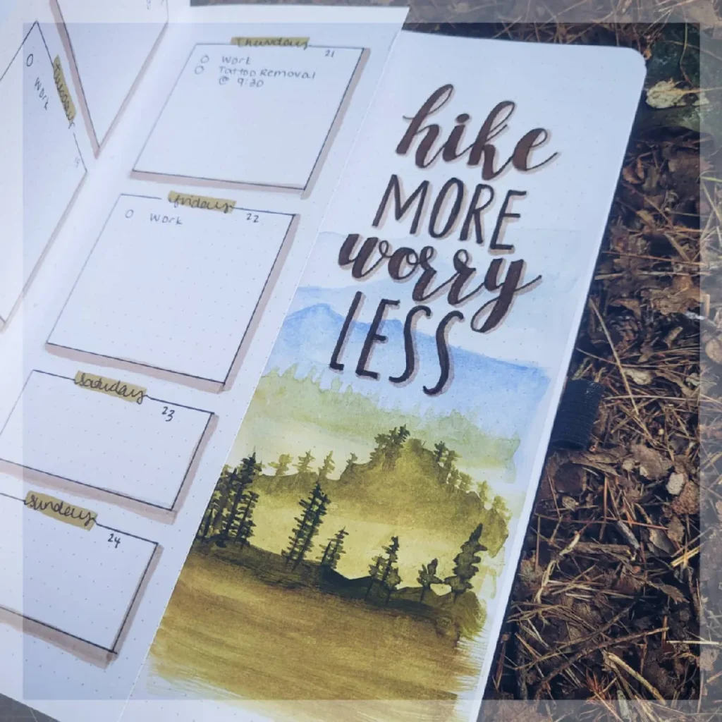A colorful bullet journal page with hike more worry less text and blank sections for planning the week ahead.